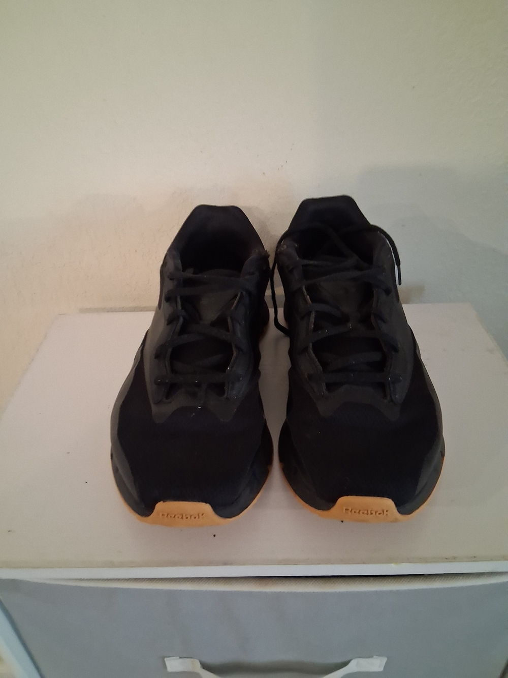 Reebok Black Sneakers with Gold Accent Sole